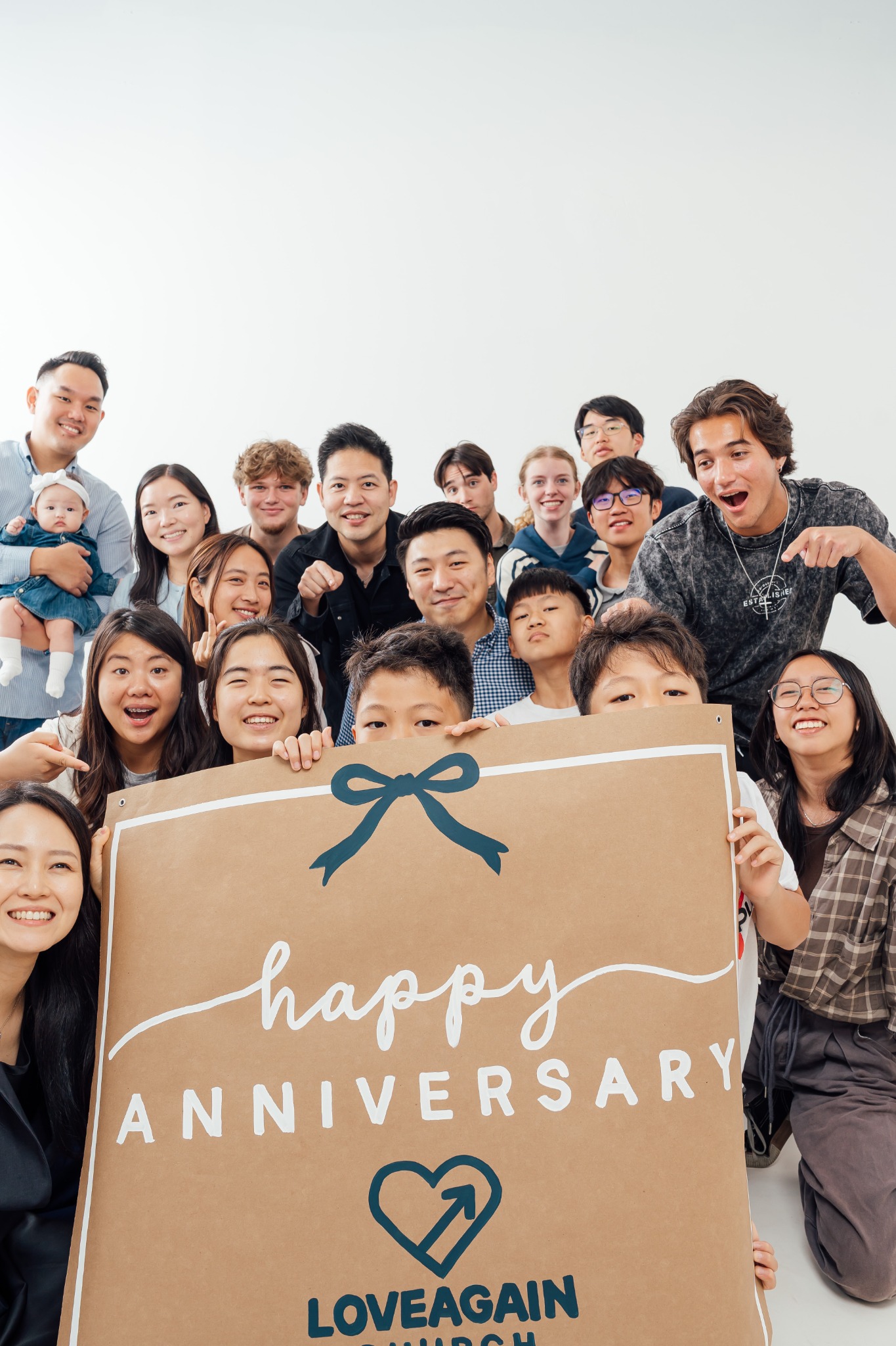Loveagain Church family celebrating the church’s first anniversary